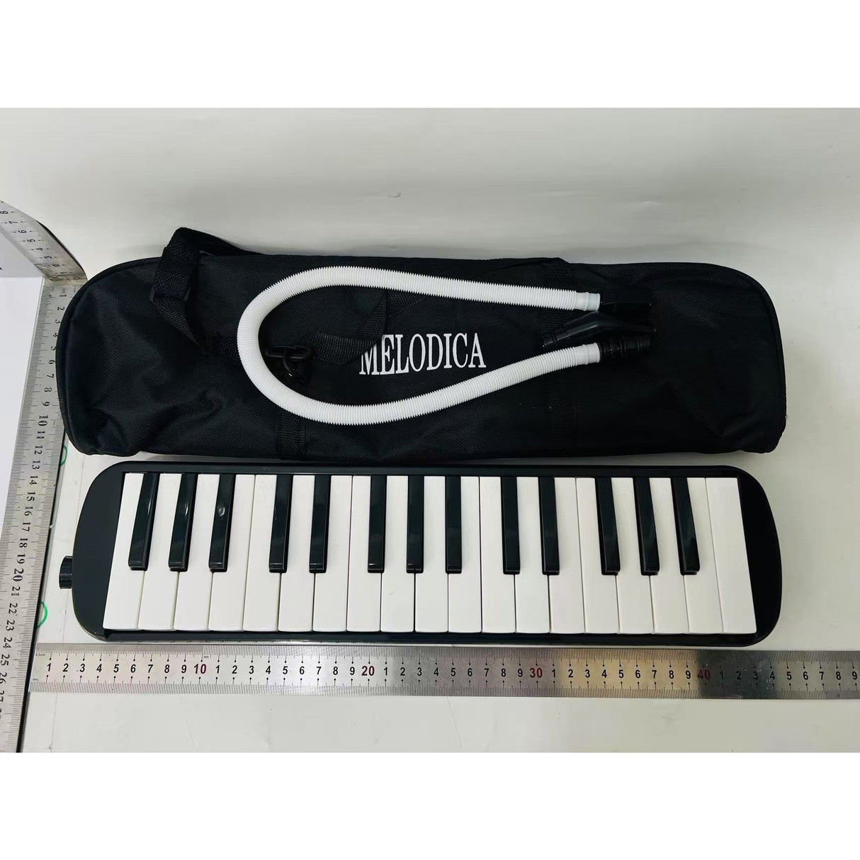 Muzicuta Melodica 32 Clape, Flippy, din ABS, pentru Incepatori, 45 x 13 x 7 cm, Include Husa si Suflator, Negru - vivimall.ro