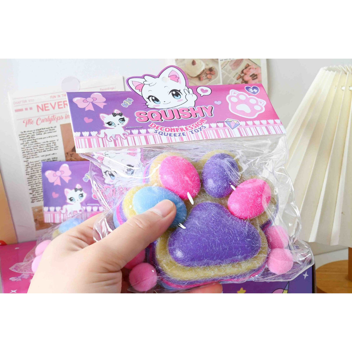 Jucarie Antistres Squishy, Vivimall, cu Revenire Lenta, Model Labuta de Pisica Pufoasa, 12.5x10.5 cm, 220g, Squeeze Pinch Family, Ambalaj Transparent, Mov-Multicolor - vivimall.ro