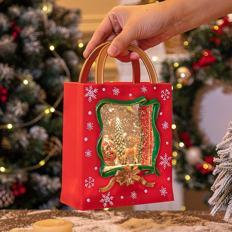Decoratiune de Craciun, Flippy, Model Sacosa Cadou cu Mos Craciun si Ren, Iluminare LED si Efect Zapada, 23 x 15 x 7.3 cm, Rosu