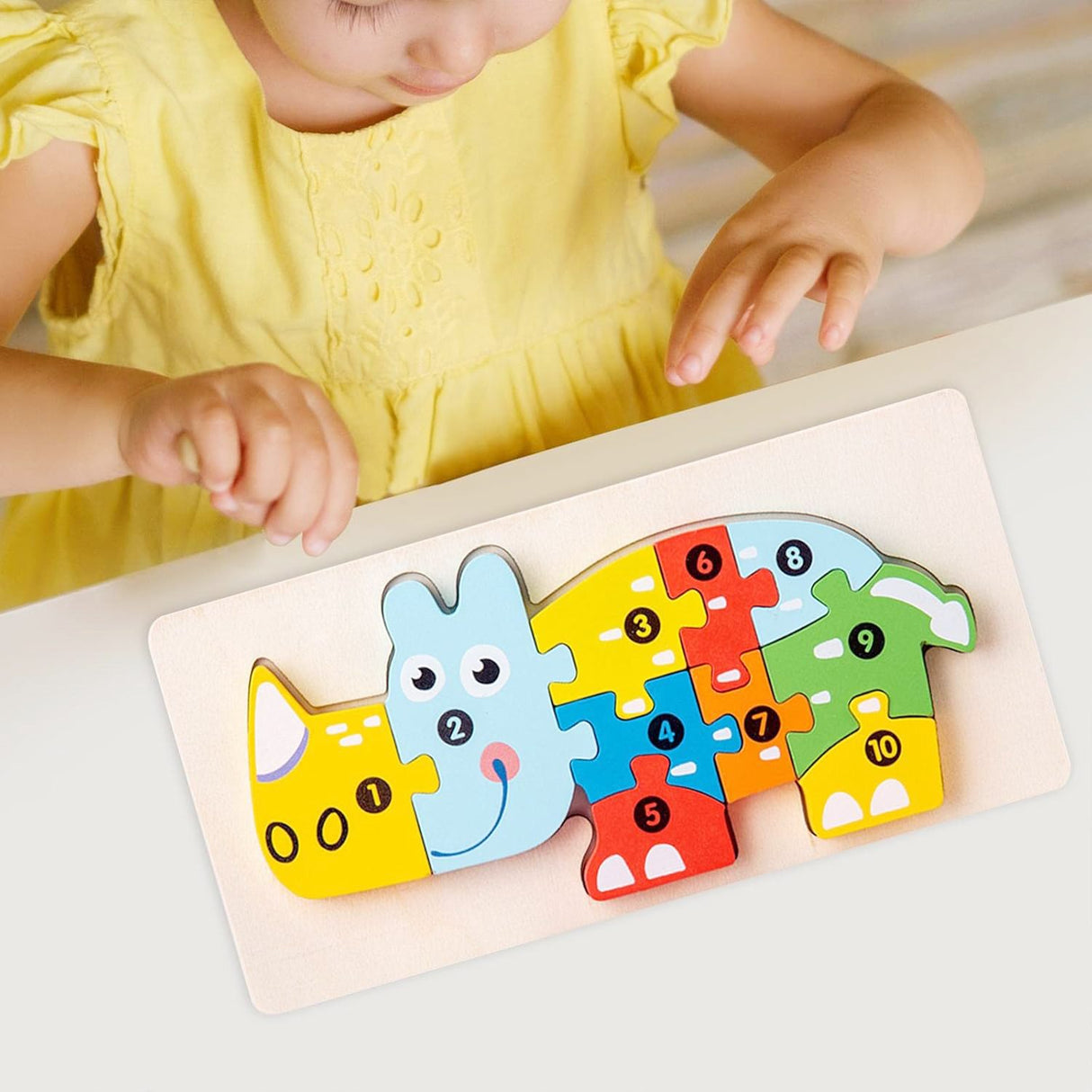 Puzzle lemn Flippy Rinocer asamblat complet, dimensiuni 20,5 x 10,5 cm, vedere laterală