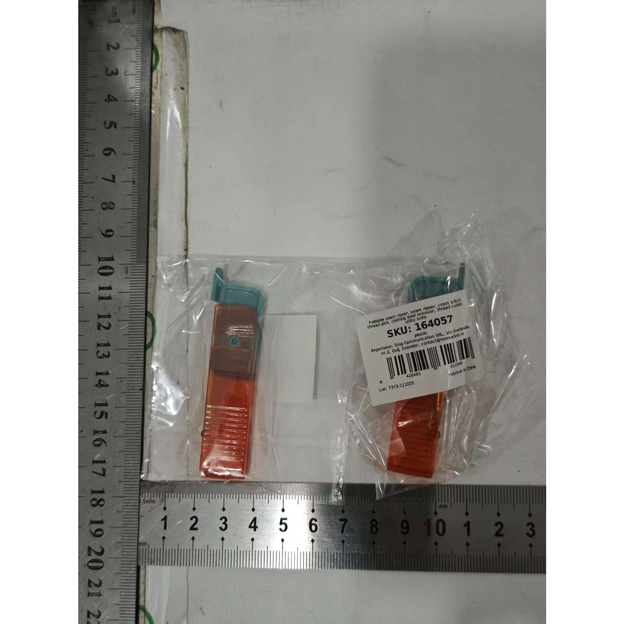 Dispozitiv pentru Descusut, Flippy, Taietor de Etichete, 1.7 x 7 cm, Pliabil, din Plastic, Albastru/Portocaliu