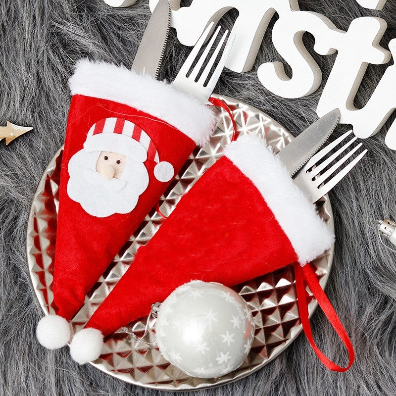 Husa decorativa festiva pentru 3 tacamuri Flippy, model caciulita cu Mos Craciun, material textil si poliester, 19 x 10 cm, rosu - vivimall.ro