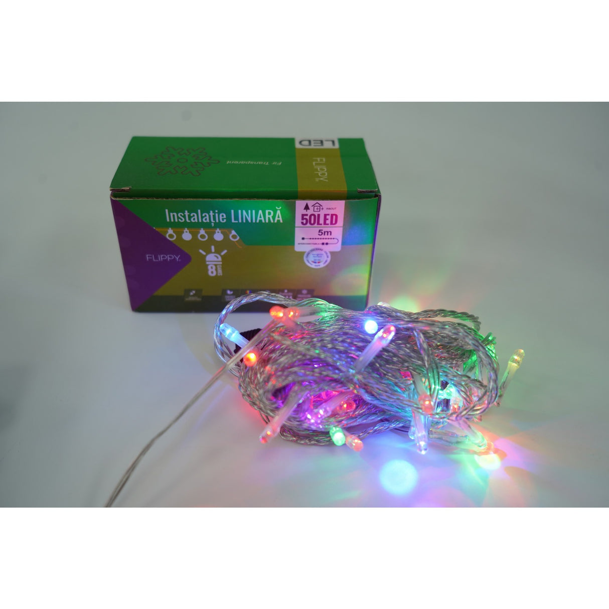 Instalatie Craciun, 15 m, 150 Led-uri ,Liniara, Rosu/Albastru/Rosu/Verde, Flash, Transformator cu telecomanda, Interconectabila, Prelungitor 3 m inclus, Fir Verde, Flippy - vivimall.ro