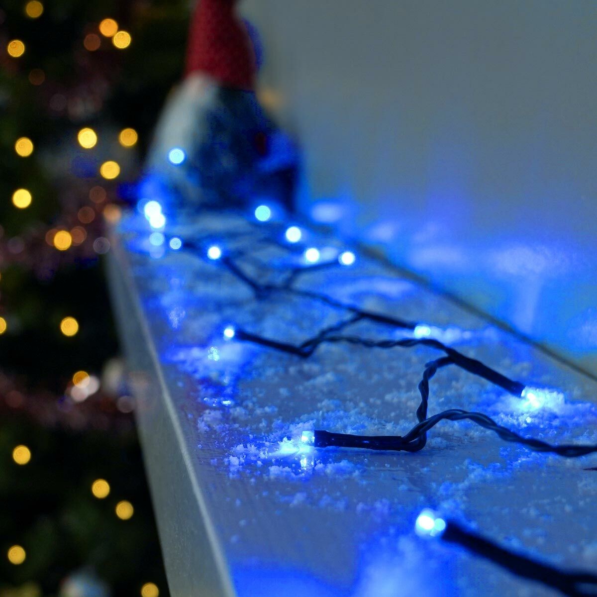 Instalatie de Craciun liniara Yoto, 17 m, din care 1 m cablu priza 220V, 200 LED, 8 jocuri de lumini, controler, fir negru, albastru - vivimall.ro