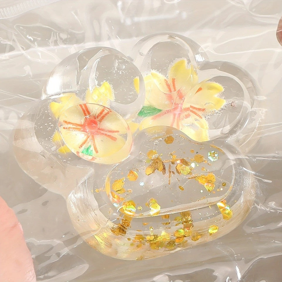 Jucarie Antistres Squishy, Vivimall, Labuta de Pisica Pufoasa, cu Revenire Lenta, 7 x 6.5 cm, Model Flori 2, Transparent - vivimall.ro