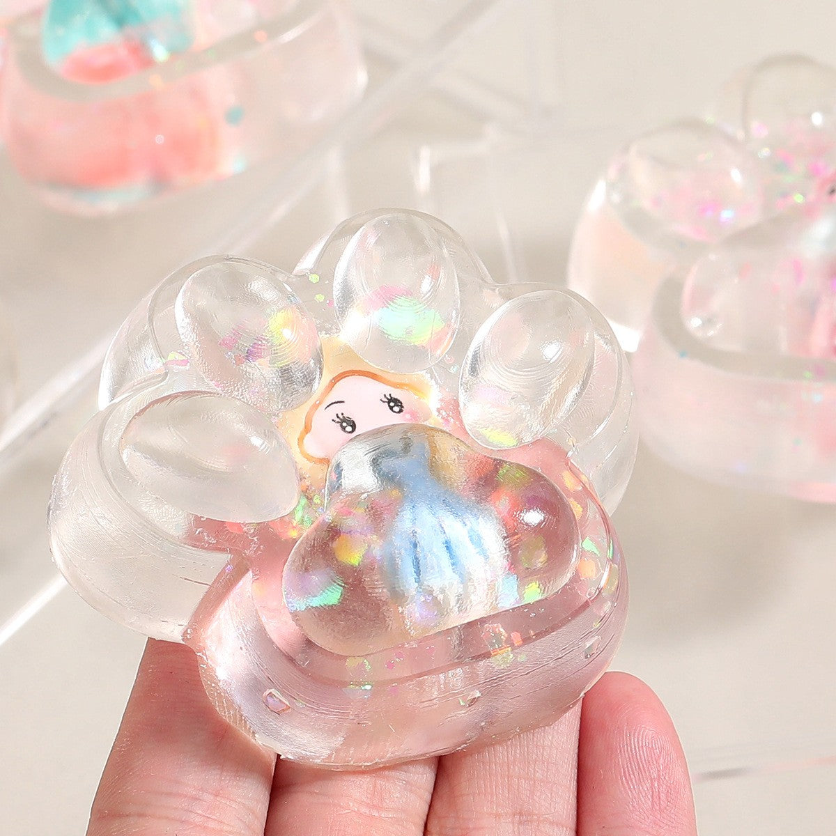 Jucarie Antistres Squishy, Vivimall, Labuta de Pisica Pufoasa, cu Revenire Lenta, 7 x 6.5 cm, Model Printesa, Multicolor - vivimall.ro