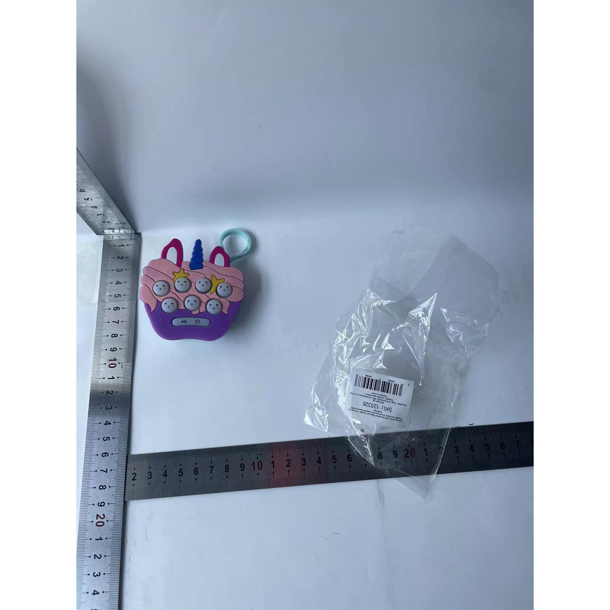 Jucarie pentru copii portabila Vivimall, joc Gopher, cu lumini si muzica, tip breloc, model unicorn, material silicon si ABS, multicolor - vivimall.ro