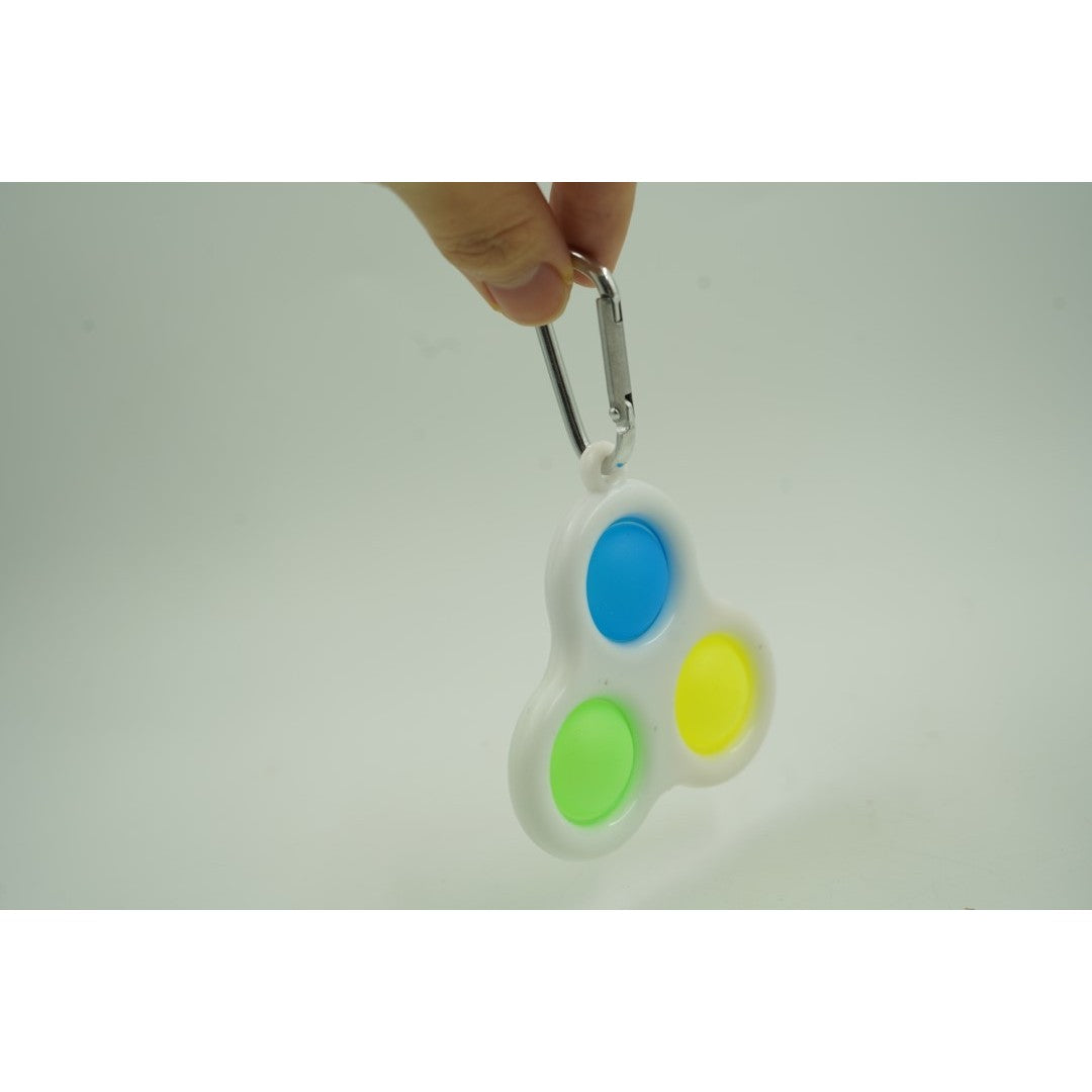 Jucarie Senzoriala Antistres, Simple Dimple, tip breloc , triunghi, 8 cm, multicolor, Alb