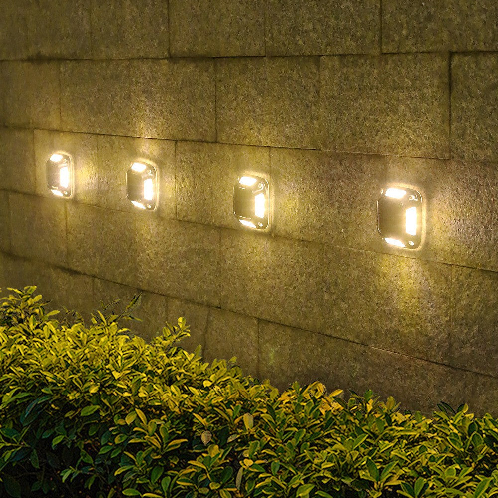 Lampa solara LED pentru gradina Flippy, 8 LED-uri, prindere de perete sau impamantare, IP65, forma patrat, material ABS si Policarbonat, 9 x 9 cm, baterie 1.2V, 600 mah, alb cald - vivimall.ro