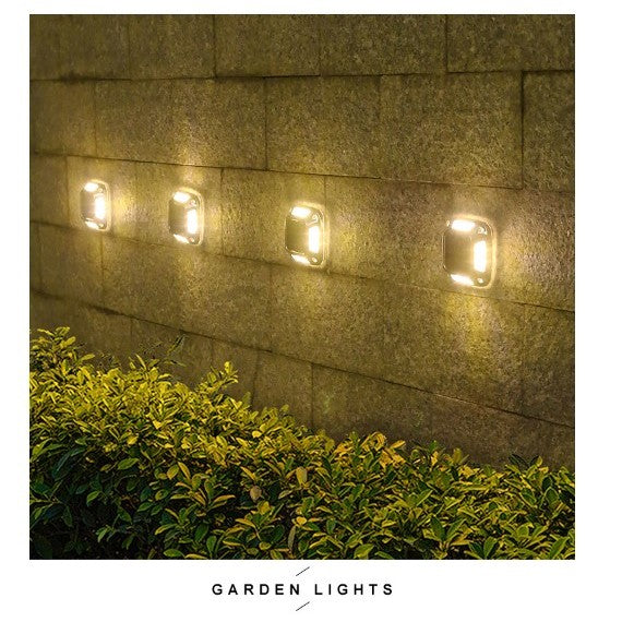Lampa solara LED pentru gradina Flippy, 8 LED-uri, prindere de perete sau impamantare, IP65, forma patrat, material ABS si Policarbonat, 9 x 9 cm, baterie 1.2V, 600 mah, alb cald - vivimall.ro