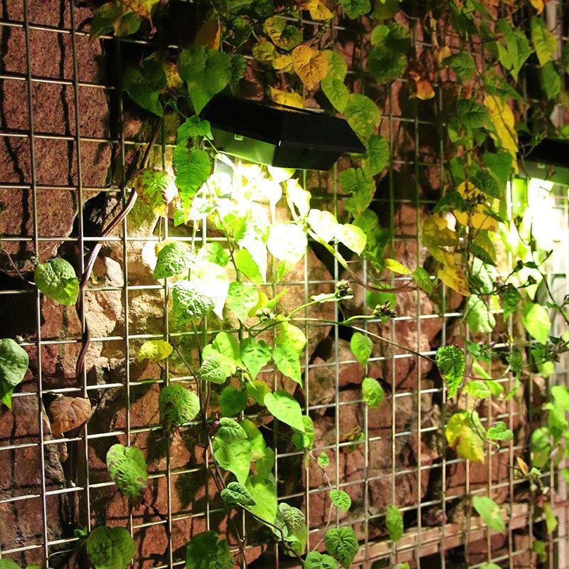 Lampa solara LED pentru gradina/scari/balustrade Flippy, 3.7V, ABS, 1200mAh, 12 x 6 cm, 12 LED-uri SMD, lumina alb cald, carcasa neagra