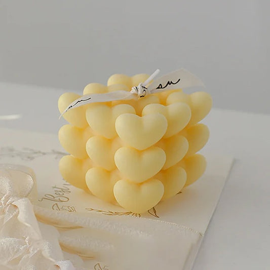 Lumanare Parfumata Decorativa, Flippy, Model Abstract Cub din Inimioare, Lumanare pentru Diferite Ocazii, 6 x 5.5 cm, Aroma de Musetel, Galben