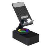 Suport telefon cu boxă Bluetooth Flippy negru, vedere frontală, design rotativ compact 18x9 cm