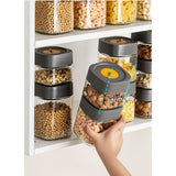 Borcan Alimentar din sticla cu Capac Vid, Vivimall, 500 ml, Inchidere Ermetica pentru Orice Tip de Produse, Design Patrat, 10 x 10 x 9 cm, Transparenta cu Capac Gri - vivimall.ro