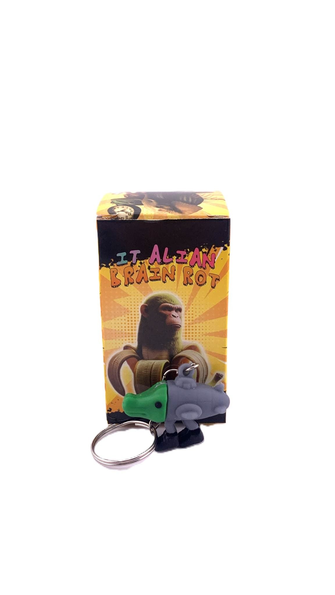 Detaliu figurină Bombardiro Crocodilo din silicon gri cu accente verde, breloc Flippy 4 cm