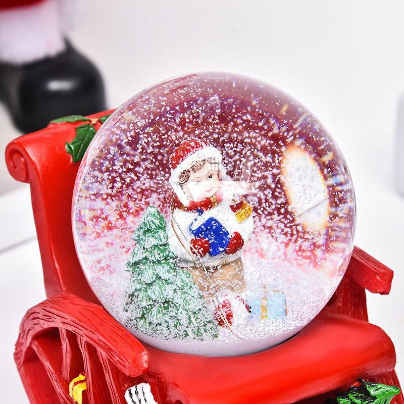 Decoratiune muzicala glob cu zapada, cu lumini si muzica, Mos Craciun, forma scaun, 13 cm, multicolor