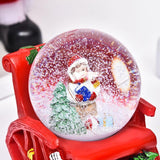 Decoratiune muzicala glob cu zapada, cu lumini si muzica, Mos Craciun, forma scaun, 13 cm, multicolor