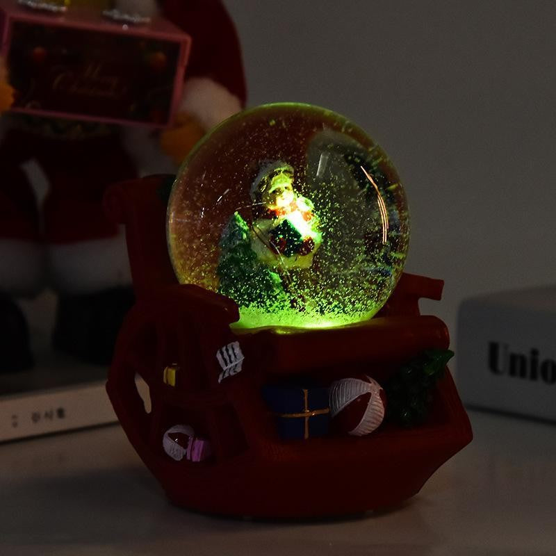 Decoratiune muzicala glob cu zapada, cu lumini si muzica, Mos Craciun, forma scaun, 13 cm, multicolor