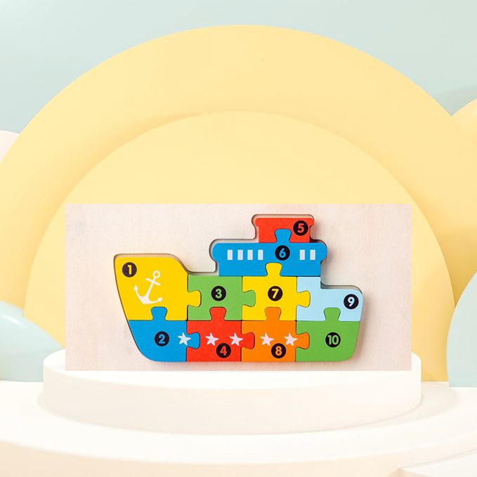 Puzzle lemn 3D Flippy model Navă lângă mâna unui copil mic, scară dimensiuni piese