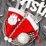 Husa decorativa festiva pentru 3 tacamuri Flippy, model caciulita cu Mos Craciun, material textil si poliester, 19 x 10 cm, rosu - vivimall.ro