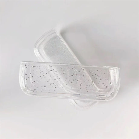 Husă protecție IQOS Iluma transparent sclipici argintiu, detaliu lateral cu acces la port de încărcare