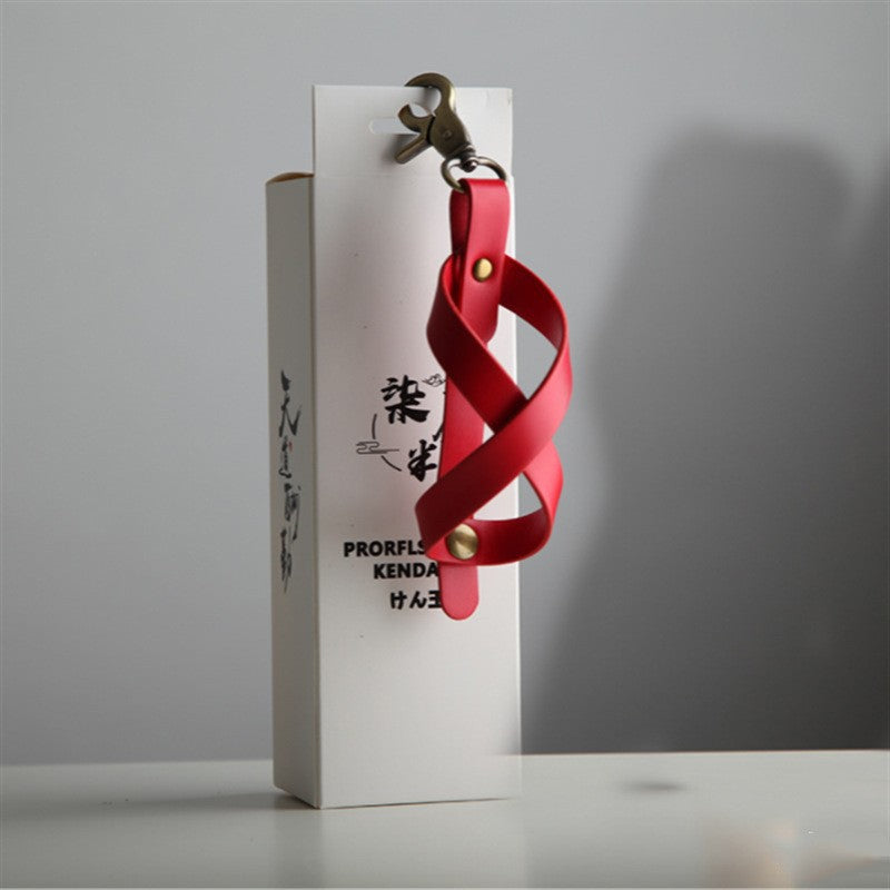 Husa pentru Kendama, Vivimall, Husa de Depozitare pentru Kendama, din Piele Ecologica, Catarama cu Agatare pentru Transportare, Model Breloc 8, 12 x 6 cm, Rosu - vivimall.ro