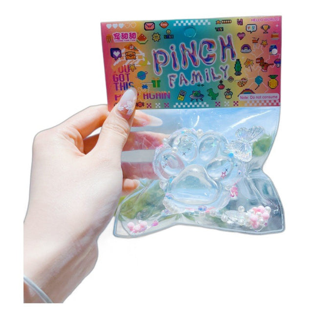 Jucarie Antistres Squishy, Flippy, Labuta de Pisica Pufoasa, cu Revenire Lenta, 6 x 6 cm, Model Crystal Ice, Transparent - vivimall.ro