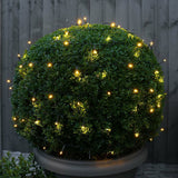 Instalatie de Craciun liniara Yoto, 10 m, din care 1 m cablu priza 220V, 100 LED, 8 jocuri de lumini, beculet in 6 colturi, pentru interior, controler, fir negru, alb cald - vivimall.ro