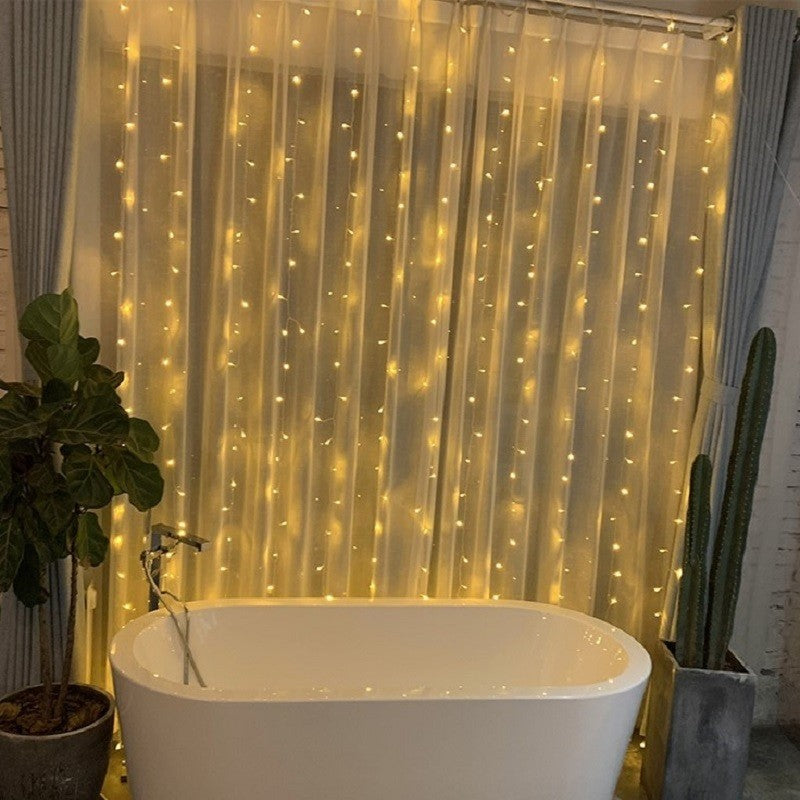Instalatie Craciun, Tip Perdea, IP44, 15 m x 1 m, 900 LED-uri, Alb cald, cu flash, Transformator, Interconectabila, Prelungitor 5 m inclus, Fir transparent, Interior/ Exterior, Vivimall - vivimall.ro