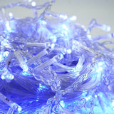 Instalatie Craciun Yoto, Tip Franjuri/Turturi, 7 m, 200 LED-uri, Prelungitor 1.5 m, 8 Jocuri de Lumini, Interconectabila, Conectare la Retea, Fir transparent, Interior/Exterior, Albastru - vivimall.ro