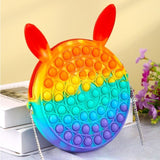 Jucarie antistres din silicon Flippy, Geanta Pop It, Iepuras, 16 cm, Curcubeu - vivimall.ro