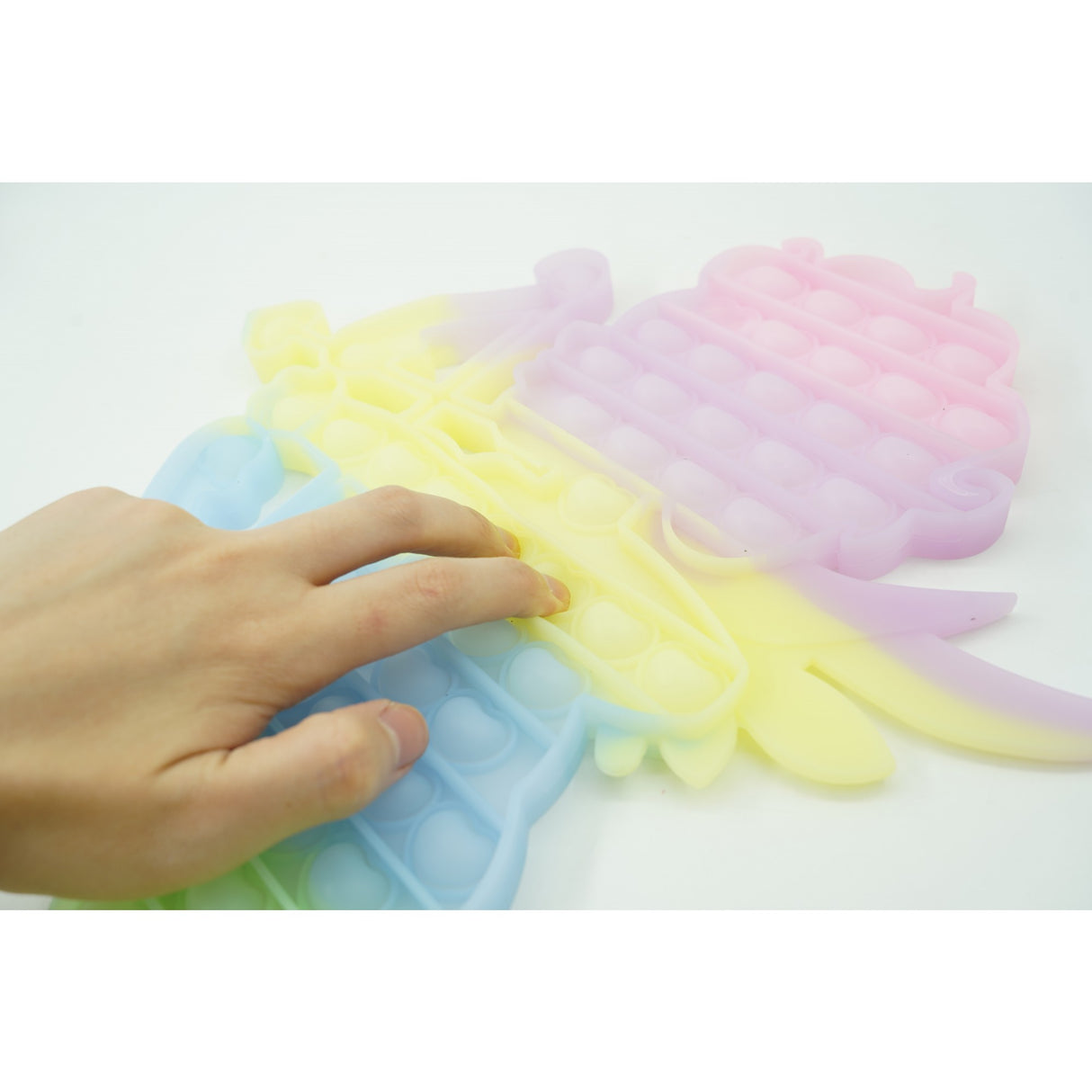 Jucarie antistres din silicon Flippy, Pop it Now and Flip It , 40x45 cm, Cupidon, Fosforescent, Multicolor - vivimall.ro