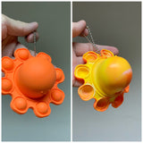 Jucarie Antistres, Flippy, Tip Pop It, Caracatita Reversibila, din Silicon, 20 x 10 cm, Portocaliu