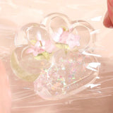 Jucarie Antistres Squishy, Flippy, Labuta de Pisica Pufoasa, cu Revenire Lenta, 7 x 6.5 cm, Model Flori 1, Transparent - vivimall.ro