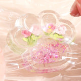 Jucarie Antistres Squishy, Flippy, Labuta de Pisica Pufoasa, cu Revenire Lenta, 7 x 6.5 cm, Model Flori 1, Transparent - vivimall.ro