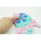 Jucarie Senzoriala Antistres, Simple Dimple, Delfin, Macarons