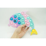 Jucarie Senzoriala Antistres, Simple Dimple, Delfin, Macarons