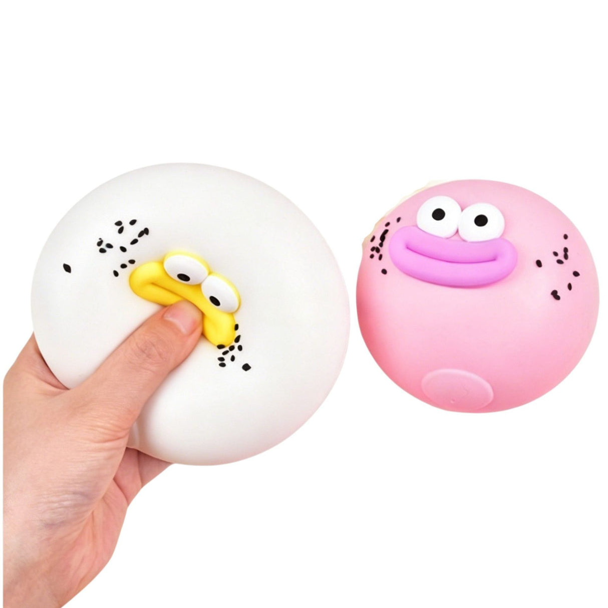 Jucărie senzorială squishy Flippy gogoașă 9x9 cm pe fundal neutru, culoare albă cu accente