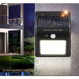 Lampa cu incarcare solara si senzor de miscare pentru exterior, 64 LED cu distanta de inductie, montaj pe perete, fara cabluri, Flippy