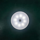 Lampa de Veghe LED, Flippy, cu Senzor de Miscare, 2 Moduri de Iluminare, Lumina Alba Rece, Acumulator 300 mAh, Incarcare USB, 0.6 W, Design Rotund, 8.5 x 2.3 cm, Alb