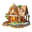 Set construcție Flippy Forest Log Cabin, 860 piese ABS multicolor, vedere frontală a căsuței asamblate