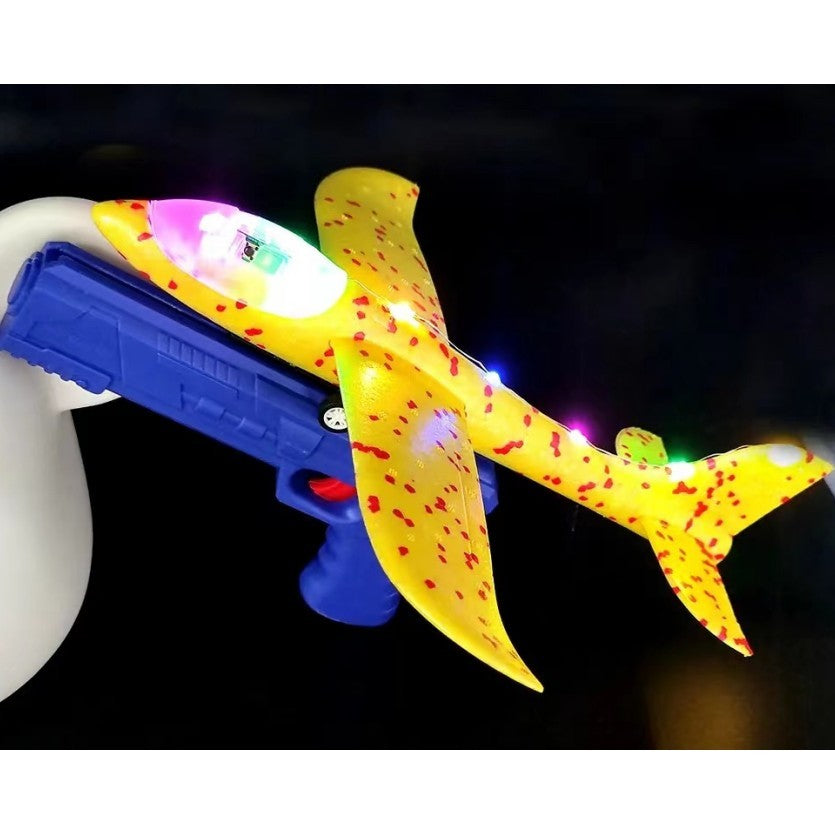 Pistol Cu Lansator De Avion, Din Polistiren+Plastic, +3 Ani, Avion 38 Cm, Lansare 10 M, Cu Lumini Si Roti, Galben/ - vivimall.ro