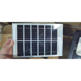 Proiector LED/Lampa solara de exterior Flippy, 20 cm x 25 cm, Rezistent la Apa IP67, cu Panou Solar, 220 LED SMD, 100W, Senzor de lumina, Timer, cu Telecomanda, 2 moduri de iluminat, kit montaj inclus, Lumina Rece, Resigilat