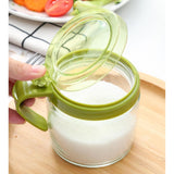 Recipient Condimente, Din Stilca, 180 Ml, Cu Maner Si Lingurita, Capac Transparent,