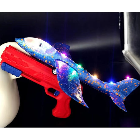 Pistol Cu Lansator De Avion, Din Polistiren+Plastic, +3 Ani, Avion 38 Cm, Lansare 10 M, Cu Lumini Si Roti, Rosu/ - vivimall.ro
