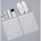 Set 50 de Saci de Depozitare Incaltaminte, Flippy, de Protectie, pentru Voiaj, Netesut, Rezistenti la Praf, Protectie Solara, Anti-Ingalbenire, 38x32 cm, Marime Medie, Transparent