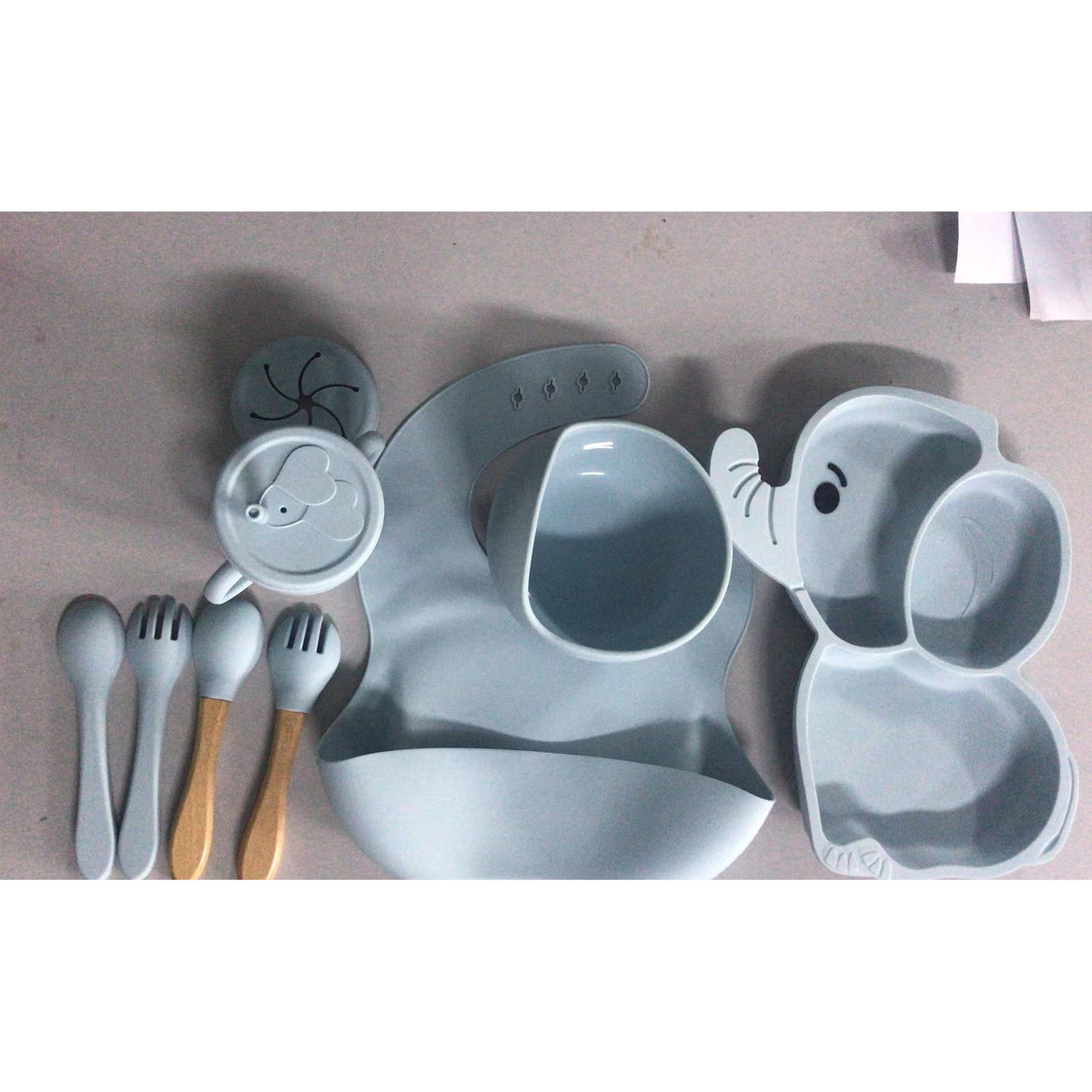 Set 10 Piese Servire Masa. Flippy, pentru Bebelusi si Copii, din Silicon/Lemn, cu Ventuze Anti-alunecare, fara Alergeni. +6 Luni, Model Elefant, Albastru Deschis