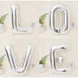 Set 4 Baloane Din Folie Metalizata, Figurine Litere, Model Scris Love, Tema Iubire, 80 Cm, Ambalaj Individual, Pai Inclus, Umflare Cu Aer Sau Heliu,