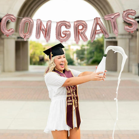 Set 8 Baloane din Folie Metalizata, Flippy, Model Scris Congrats, Litere de 40 cm, Tema Absolvire, Baloane Party, Ambalaj Individual, Pai Inclus, Umflare cu Aer sau Heliu, Roz