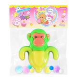 Jucărie antistres Squishy Flippy Banana Monkey din TPR, culoare galben și verde, vedere frontală în ambalaj transparent